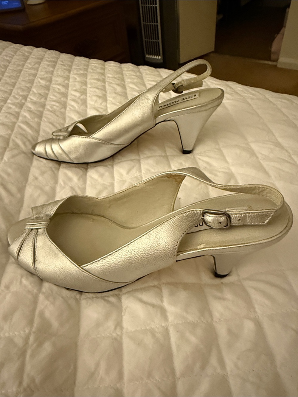 Steve madden  silver leather uppers ,slingback pumps, size 8 three inch heels